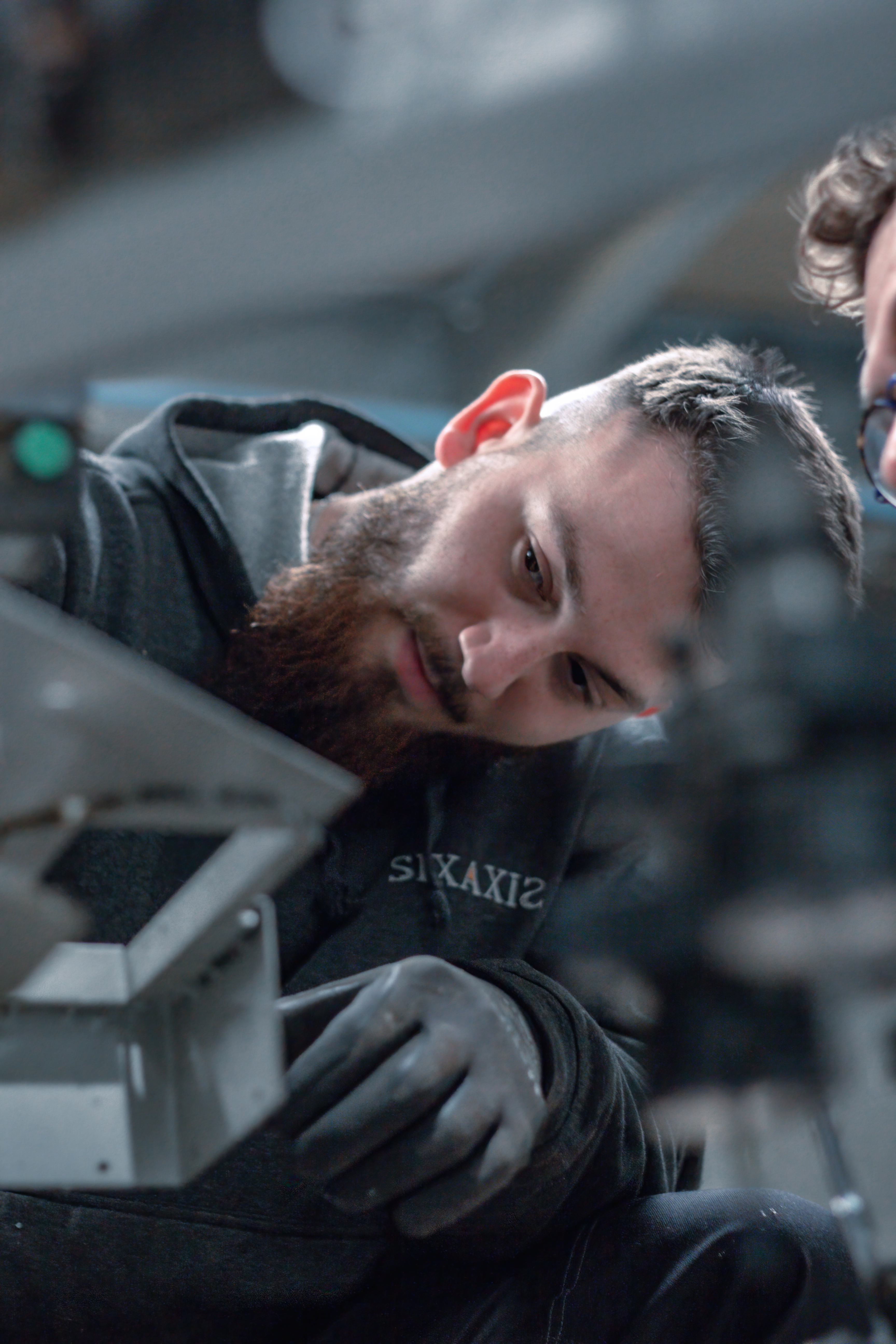 Sixaxis Engineer Working